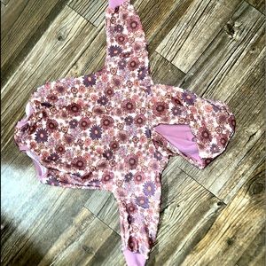 Handmade hooded sweater romper. Not very thick material. 12-18 month. Stretchy